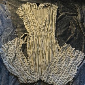 Blue and white vertical stripes jumpsuit.